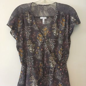 Grey blouse with lace and light floral print.